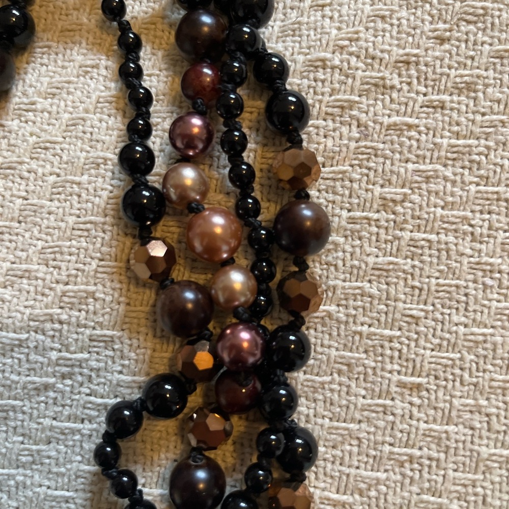 Very long strand necklace